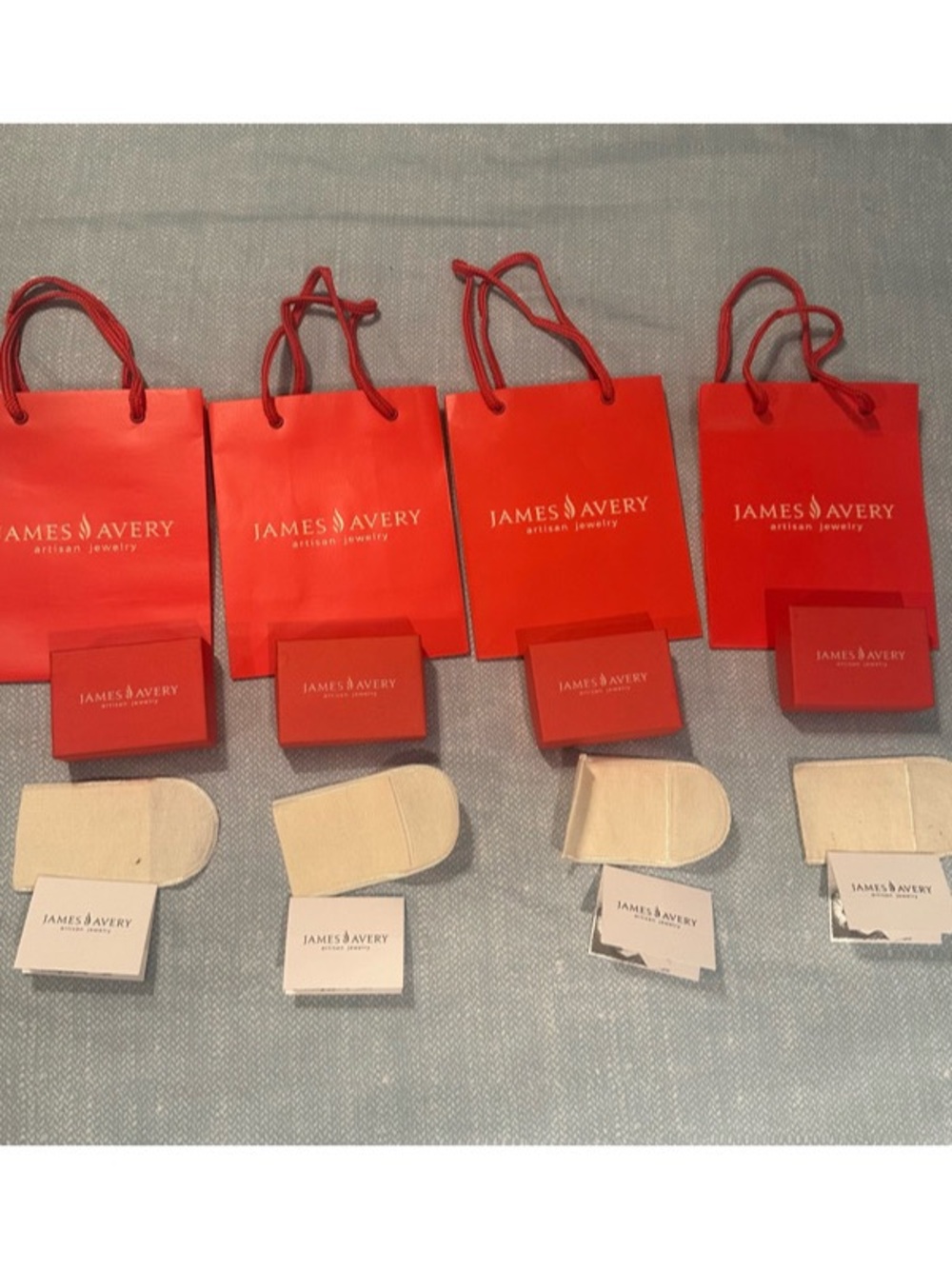 JAMES AVERY 
5Gift bags, 5 jewelry boxes set